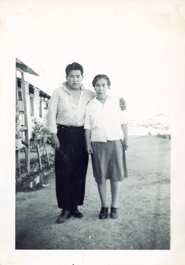 Paul’s father (Joe) and grandmother in front of the barracks at the camp in Gila River, Arizona.